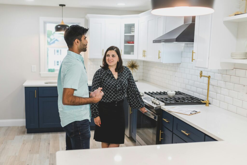 A Man and a Woman Talking in the Kitchen