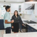 A Man and a Woman Talking in the Kitchen