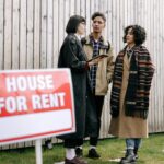 Interracial Couple Talking to Real Estate Agent